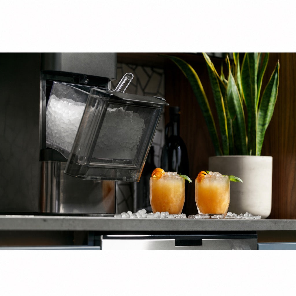 Carbon black nugget ice maker dispensing